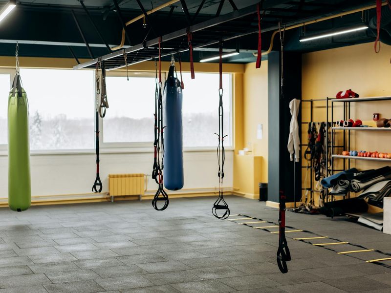 Dramatic lighting in a minimalist gym interior